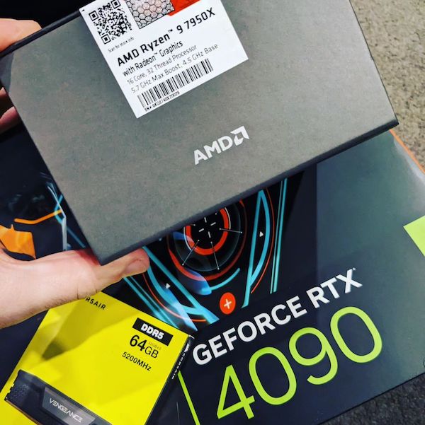 Three boxes, one containing an AMD Ryzen 9 CPU, one containing 64GB of Corsair RAM, and another showing the label for a GeForce RTX 4090 GPU.